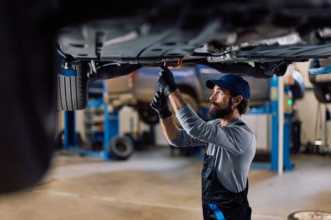 Mechanic working on car